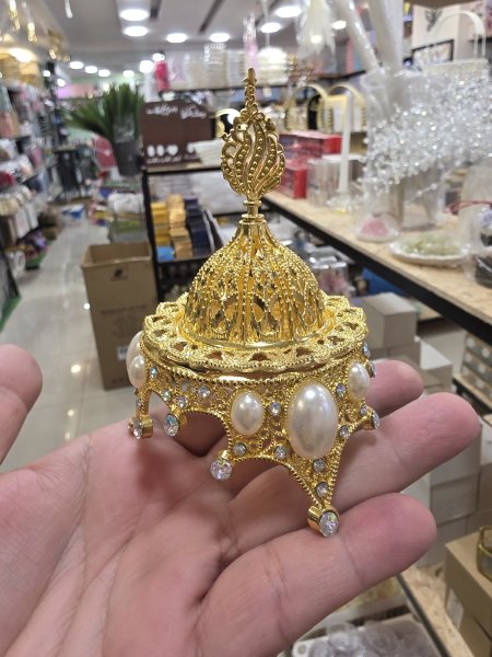 مبخرة حديد ذهبي